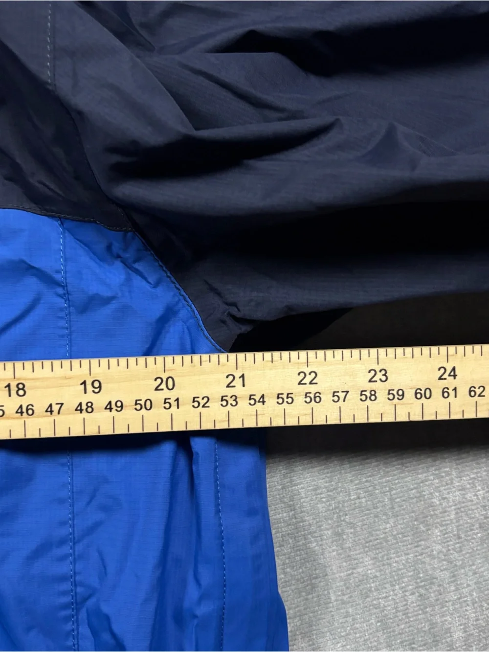 The North Face Navy & Royal Blue Hooded Rain Shell with Orange Accents